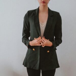 woman in black blazer and black skirt