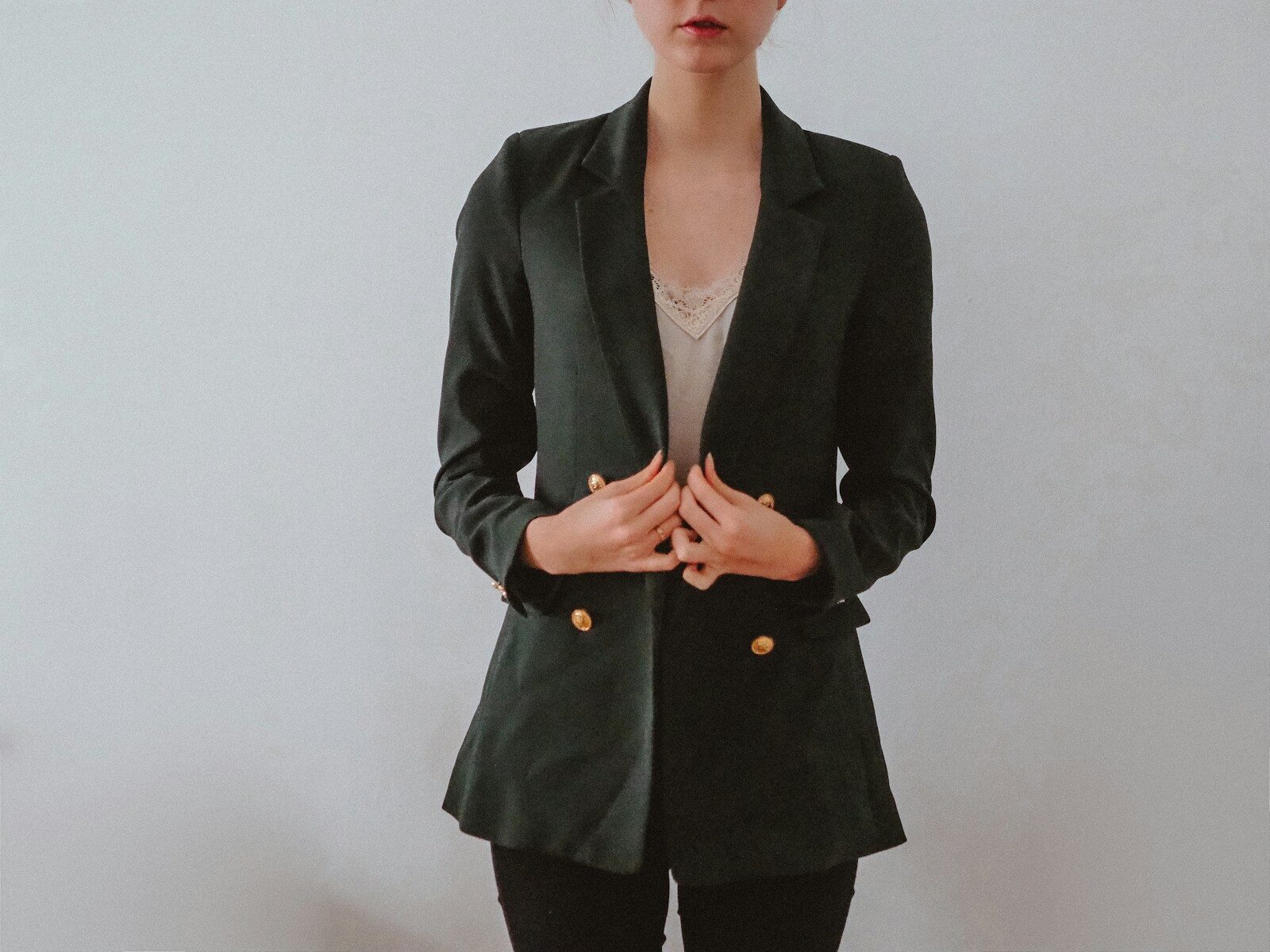 woman in black blazer and black skirt